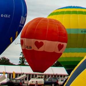 Heart hot air balloon G-BLVA, an Airtour AH-31, seen at Leigh Woods, North Somerset, United Kingdom on 9 August 2015. Photograph by Dave