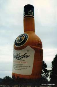 G-BMBP hot air balloon, a Thunder AND Colt Colt Whisky Bottle. Photograph by Mark Duffy