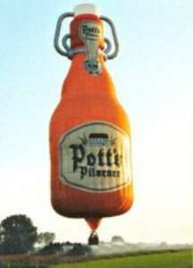 G-BSMW hot air balloon, a Thunder AND Colt Colt Flying Lager Bottle. Photograph by Chris Lane