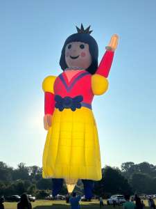 Doll hot air balloon G-BVDF, a Cameron DOLL-105 (snow white, character), seen at Corston, Bath and North East Somerset, United Kingdom on 8 July 2026. Photograph by R0nN1e