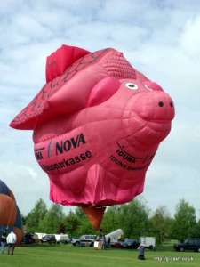 Pig hot air balloon G-BWBV, a Thunder AND Colt Colt Piggy Bank (piggy bank, banking), added to the archive 7 September 2026. Photograph by Balloon Spotters Archive