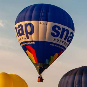 Snap hot air balloon G-CCTS, a Cameron Z-120 (snap surveys), seen at Leigh Woods, North Somerset, United Kingdom on 8 August 2014. Photograph by Dave