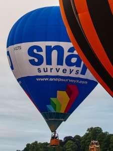 Snap hot air balloon G-CCTS, a Cameron Z-120 (snap surveys), seen at Leigh Woods, North Somerset, United Kingdom on 9 August 2015. Photograph by Dave