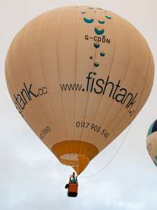 Fishtank hot air balloon G-CDDN, a Lindstrand Balloons LBL 90A, seen at Leigh Woods, North Somerset, United Kingdom on 9 August 2015. Photograph by Dave
