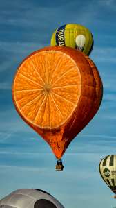 Fruit hot air balloon G-CDXW, a Cameron ORANGE-120 (orange, food), seen at Arrow, Warwickshire, United Kingdom on 30 May 2026. Photograph by Dave