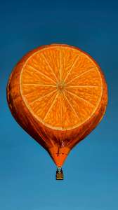 Fruit hot air balloon G-CDXW, a Cameron ORANGE-120 (orange, food), seen at Arrow, Warwickshire, United Kingdom on 29 May 2026. Photograph by Dave
