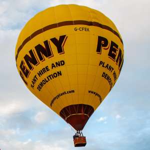 Penny hot air balloon G-CFEK, a Cameron Z-105, seen at Leigh Woods, North Somerset, United Kingdom on 9 August 2015. Photograph by Dave