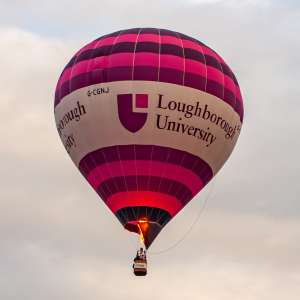 Loughborough hot air balloon G-CGNJ, a Cameron Z-105 (university), seen at Leigh Woods, North Somerset, United Kingdom on 9 August 2015. Photograph by Dave