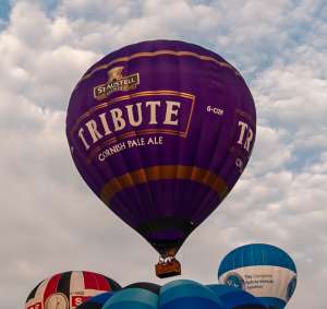 Tribute hot air balloon G-CIZM, a Cameron Z-210