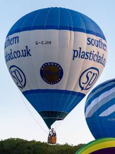 Plasticlad hot air balloon G-CJIH, a Lindstrand Technologies LTL Series 1-105, seen at Arrow, Warwickshire, United Kingdom on 29 May 2026. Photograph by Dave