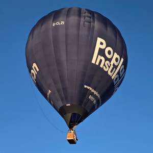 Poplar Insulation hot air balloon G-CLZI, a Cameron Z-133, seen at Leigh Woods, North Somerset, United Kingdom on 7 August 2026. Photograph by Dave