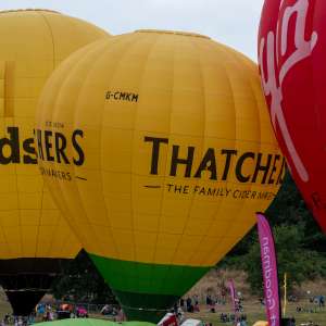 Thatchers hot air balloon G-CMKM, a Cameron Z-105 (drink), seen at Leigh Woods, North Somerset, United Kingdom on 9 August 2025. Photograph by Dave