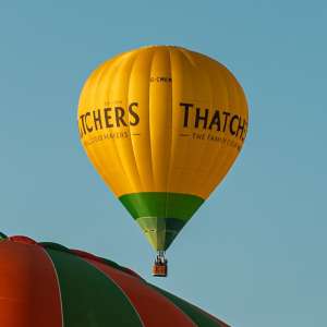Thatchers hot air balloon G-CMKM, a Cameron Z-105 (drink), seen at Leigh Woods, North Somerset, United Kingdom on 7 August 2026. Photograph by Dave