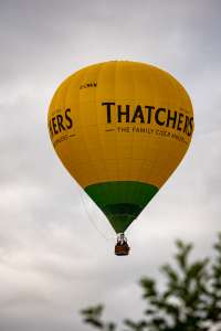Thatchers hot air balloon G-CMKM, a Cameron Z-105 (drink), seen at Horningsham, Wiltshire, United Kingdom on 11 September 2026. Photograph by Dave
