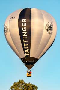 Champange hot air balloon G-CMSB, a Cameron O-90 (tattinger, drink). Photograph by Dave