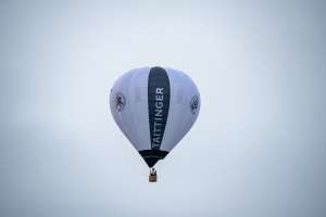 Champange hot air balloon G-CMSB, a Cameron O-90 (tattinger, drink), seen at Arrow, Warwickshire, United Kingdom on 31 May 2025. Photograph by Dave