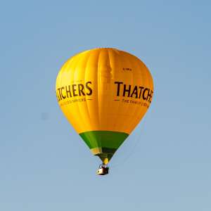 Thatchers hot air balloon G-CMTW, a Cameron Z-210, seen at Leigh Woods, North Somerset, United Kingdom on 7 August 2026. Photograph by Dave