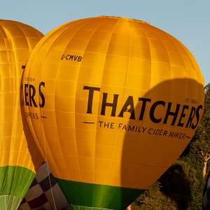 Thatchers hot air balloon G-CMVB, a Cameron Z-105, seen at Leigh Woods, North Somerset, United Kingdom on 7 August 2026. Photograph by Dave