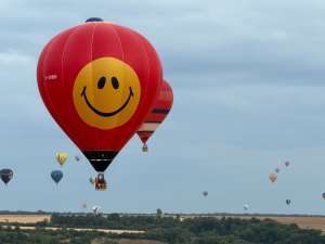 Smile hot air balloon G-CNBG, a Balony Kubicek SPOL. S R.O. BB30E, seen at Dommartin-la-Chaussée, Meurthe-et-Moselle, France on 1 August 2026. Photograph by brad-ox
