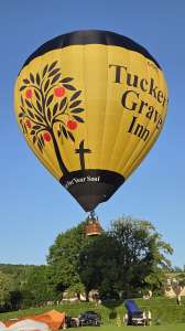 Tuckers Grave Inn hot air balloon G-CNDI, a Diamond S-105