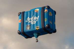Luggage hot air balloon G-CNDJ, a Cameron Graz BOX-110 (send my bag, suitcase), seen at Leigh Woods, North Somerset, United Kingdom on 9 August 2026. Photograph by Dave