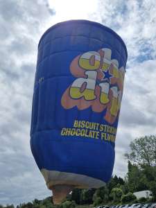 Choc Dips hot air balloon G-DIPI, a Cameron TUB-80 (food), seen at Bath and North East Somerset, England, United Kingdom on 19 July 2025. Photograph by Dave