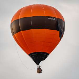 Ninja hot air balloon G-GNJR, a Kubicek Factory S.R.O. BB26E. Photograph by Dave