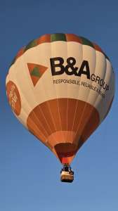 B&A hot air balloon G-JIMA, a Cameron Z-105, seen at Charlton, Wiltshire, United Kingdom on 11 July 2026. Photograph by Dave