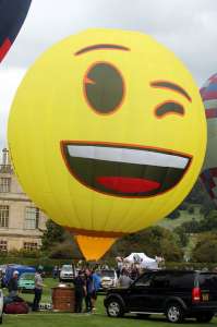 Emoji hot air balloon G-MOJI, a Lindstrand Technologies LTL Series Special - Sphere. Photograph by G Bann
