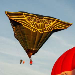 Aston Martin hot air balloon G-OAML, a Cameron AML-105, seen at Leigh Woods, North Somerset, United Kingdom on 11 August 2018. Photograph by Dave
