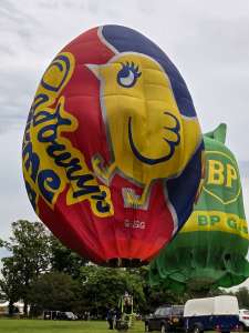 Cadburys hot air balloon G-OEGG, a Cameron EGG-65 (creme egg), seen at Arrow, Warwickshire, United Kingdom on 29 May 2026. Photograph by Dave