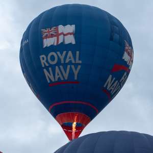 Fly Navy hot air balloon G-OFAA, a Cameron Z-105 (royal navy), seen at Leigh Woods, North Somerset, United Kingdom on 9 August 2025. Photograph by Dave