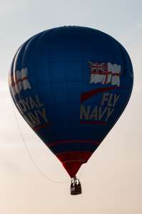 Fly Navy hot air balloon G-OFAA, a Cameron Z-105 (royal navy), seen at Leigh Woods, North Somerset, United Kingdom on 8 August 2014. Photograph by Dave