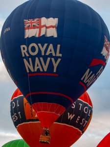 Fly Navy hot air balloon G-OFAA, a Cameron Z-105 (royal navy), seen at Leigh Woods, North Somerset, United Kingdom on 9 August 2015. Photograph by Dave
