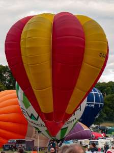 G-OJEN hot air balloon, a Cameron V-77, seen at Leigh Woods, North Somerset, United Kingdom on 9 August 2015. Photograph by Dave