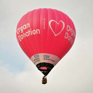 Nhs hot air balloon G-ORGN, a Kubicek Factory S.R.O. BB30Z (organ donation), seen at Leigh Woods, North Somerset, United Kingdom on 8 August 2025. Photograph by Dave