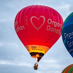 Nhs hot air balloon G-ORGN, a Kubicek Factory S.R.O. BB30Z (organ donation), seen at Leigh Woods, North Somerset, United Kingdom on 9 August 2025. Photograph by Dave