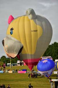Dog hot air balloon G-OWOF, a Cameron Z-105 (animals), seen at Leigh Woods, North Somerset, United Kingdom on 8 August 2025. Photograph by Dave