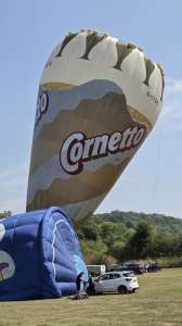 Cornetto hot air balloon G-OZOE, a Lindstrand Balloons LBL Cornetto (cone, ice cream), seen at Corston, Bath and North East Somerset, United Kingdom on 18 July 2026. Photograph by Dave