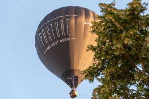 Pasture hot air balloon G-PAST, a Cameron Z-105 (food), seen at Leigh Woods, North Somerset, United Kingdom on 9 August 2026. Photograph by Dave