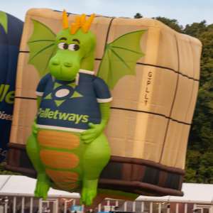 Dragon hot air balloon G-PLLT, a Lindstrand HOT AIR Balloons LBL BOX (animals), seen at Leigh Woods, North Somerset, United Kingdom on 9 August 2015. Photograph by Dave
