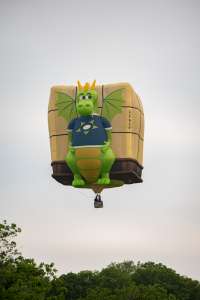 Playreview hot air balloon G-PNAD, a Lindstrand HOT AIR Balloons LBL BOX (dragon, animals), seen at Arrow, Warwickshire, United Kingdom on 31 May 2025. Photograph by Dave
