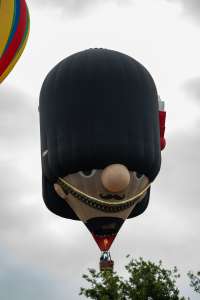 Busby hot air balloon G-POMP, a Cameron BEARSKIN-100 (guardsman, character), seen at Horningsham, Wiltshire, United Kingdom on 11 September 2026. Photograph by Dave