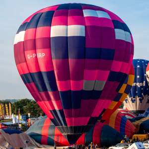 G-PURP hot air balloon, a Lindstrand HOT AIR Balloons LBL 90A, seen at Leigh Woods, North Somerset, United Kingdom on 8 August 2014. Photograph by Dave
