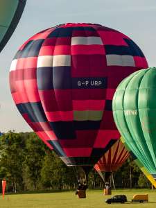 G-PURP hot air balloon, a Lindstrand HOT AIR Balloons LBL 90A, seen at Arrow, Warwickshire, United Kingdom on 30 May 2026. Photograph by Dave
