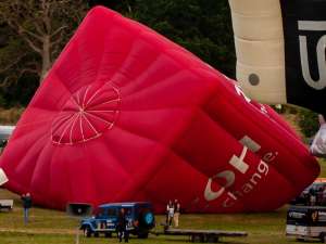 Ricoh hot air balloon G-RCOH, a Cameron CUBE-105, seen at Leigh Woods, North Somerset, United Kingdom on 9 August 2015. Photograph by Dave