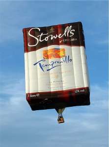 Wine hot air balloon G-STOW, a Cameron Wine BOX-90 (stowells). Photograph by Balloon Spotters Archive