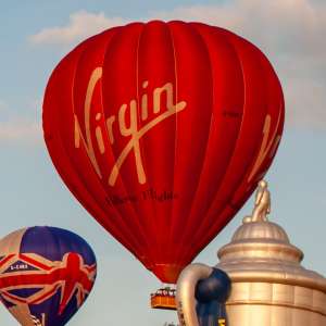 Virgin hot air balloon G-VBAE, a Cameron A-400, seen at Leigh Woods, North Somerset, United Kingdom on 8 August 2014. Photograph by Dave