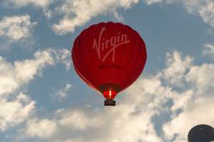 Virgin hot air balloon G-VBAX, a Cameron A-400, seen at Leigh Woods, North Somerset, United Kingdom on 9 August 2026. Photograph by Dave