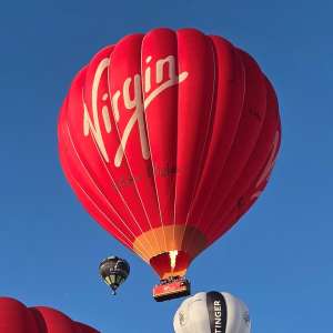 Virgin hot air balloon G-VBAX, a Cameron A-400, seen at Leigh Woods, North Somerset, United Kingdom on 7 August 2026. Photograph by Dave